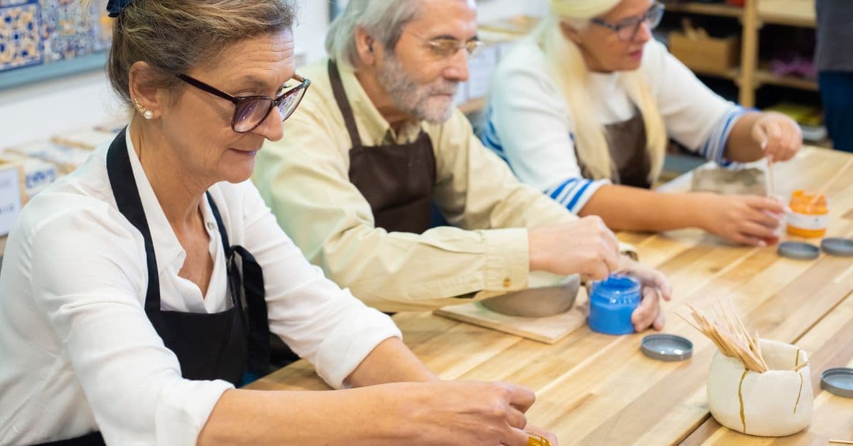 Older adults enjoying a craft activity together