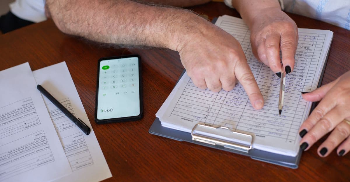 An older couple reviewing aged care costs together