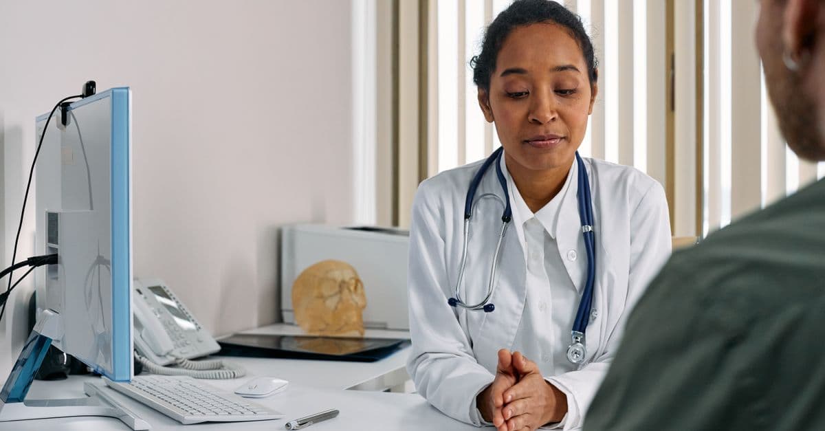 An older person at a GP appointment