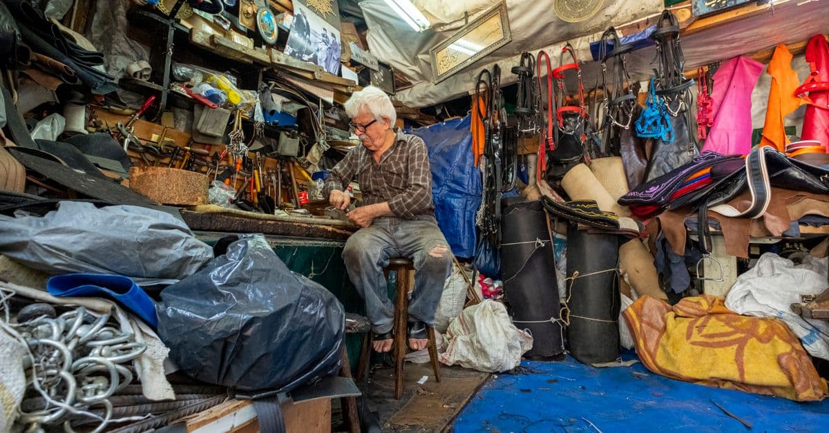 Men working together in a community shed