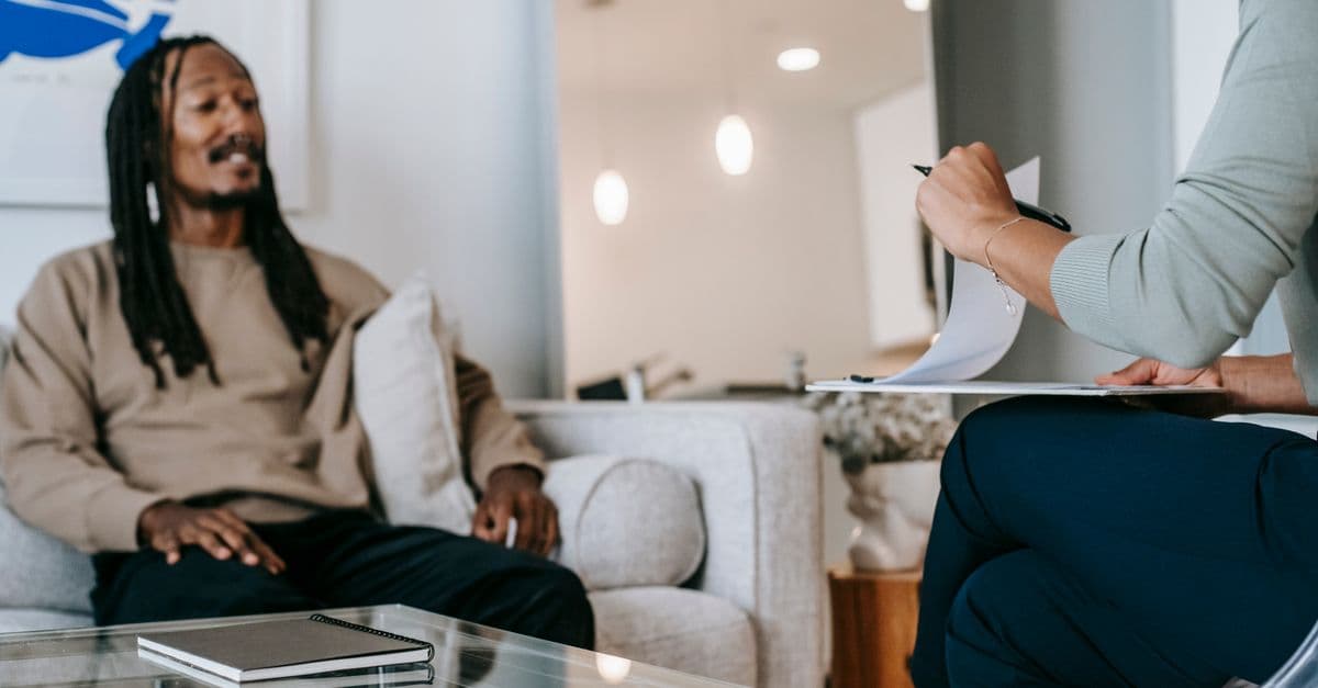 An older adult in a supportive conversation about mental health