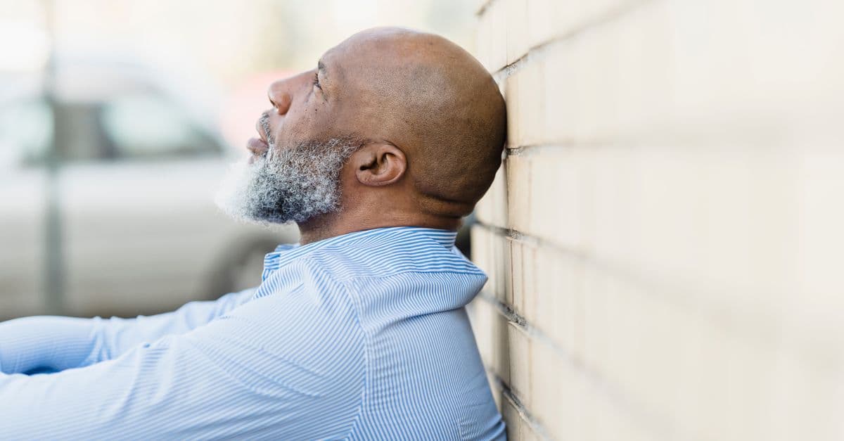 An older person waiting patiently